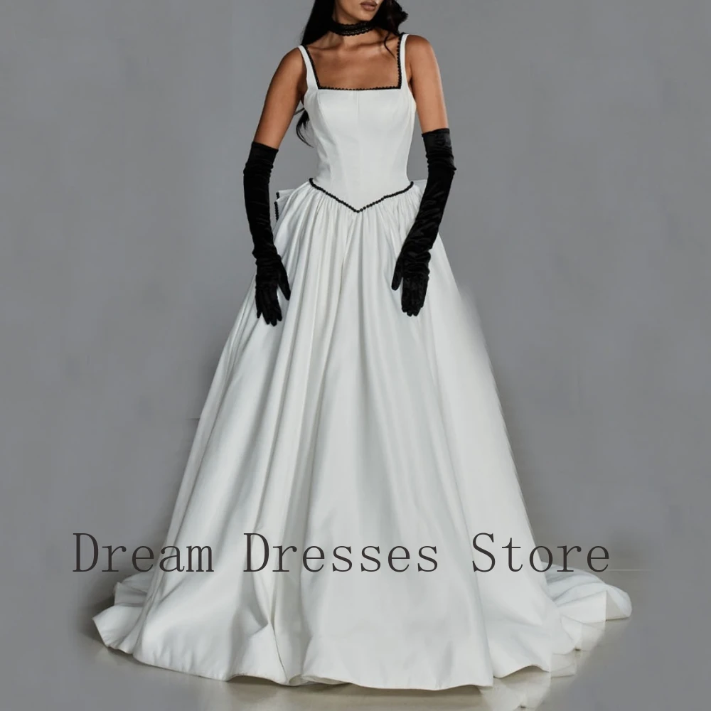 Dream Dresses Store Customized elegant wedding dress with bead embroidery bow, long square neckline, A-line skirt