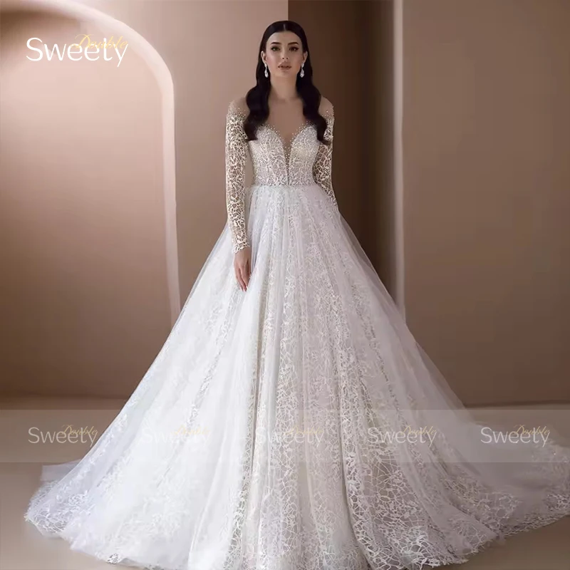 Abito da sposa elegante con perline in organza con ricamo Abito da ballo a trapezio O-Collo Abito da sposa a maniche lunghe Vestido De Novia personalizzato ﻿