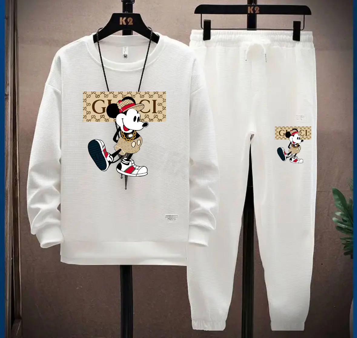 

Latest Outdoor Cross border Hot selling Brand Spring and Autumn Printed Men's Sports Hoodie Set Disney Mickey Women's Set