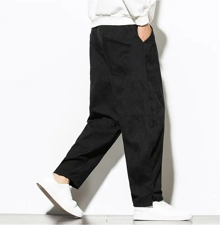 Pantaloni Harem dritti a vita media in velluto a coste tinta unita da uomo pantaloni larghi larghi a gamba larga di grandi dimensioni