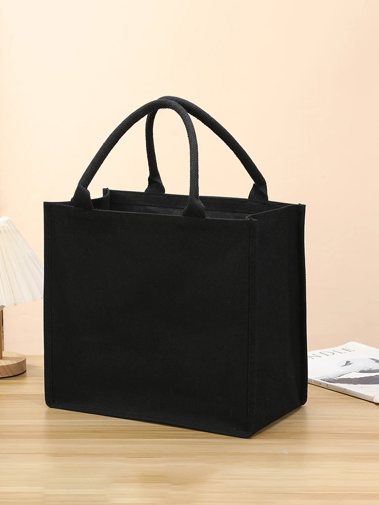 

Pure black thickened canvas handbag, large-capacity waterproof single-shoulder bag, tote bag