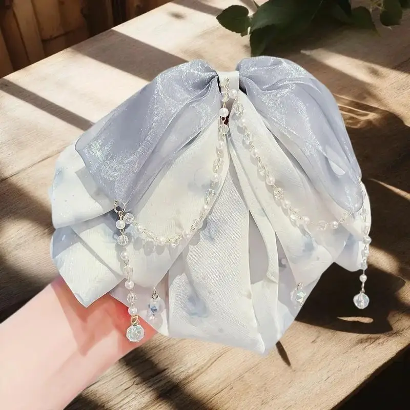 Distinctive Light Pink Chiffon Butterfly Knot Clip for Ponytails; High-End Feel with Flowing Tassel Detail