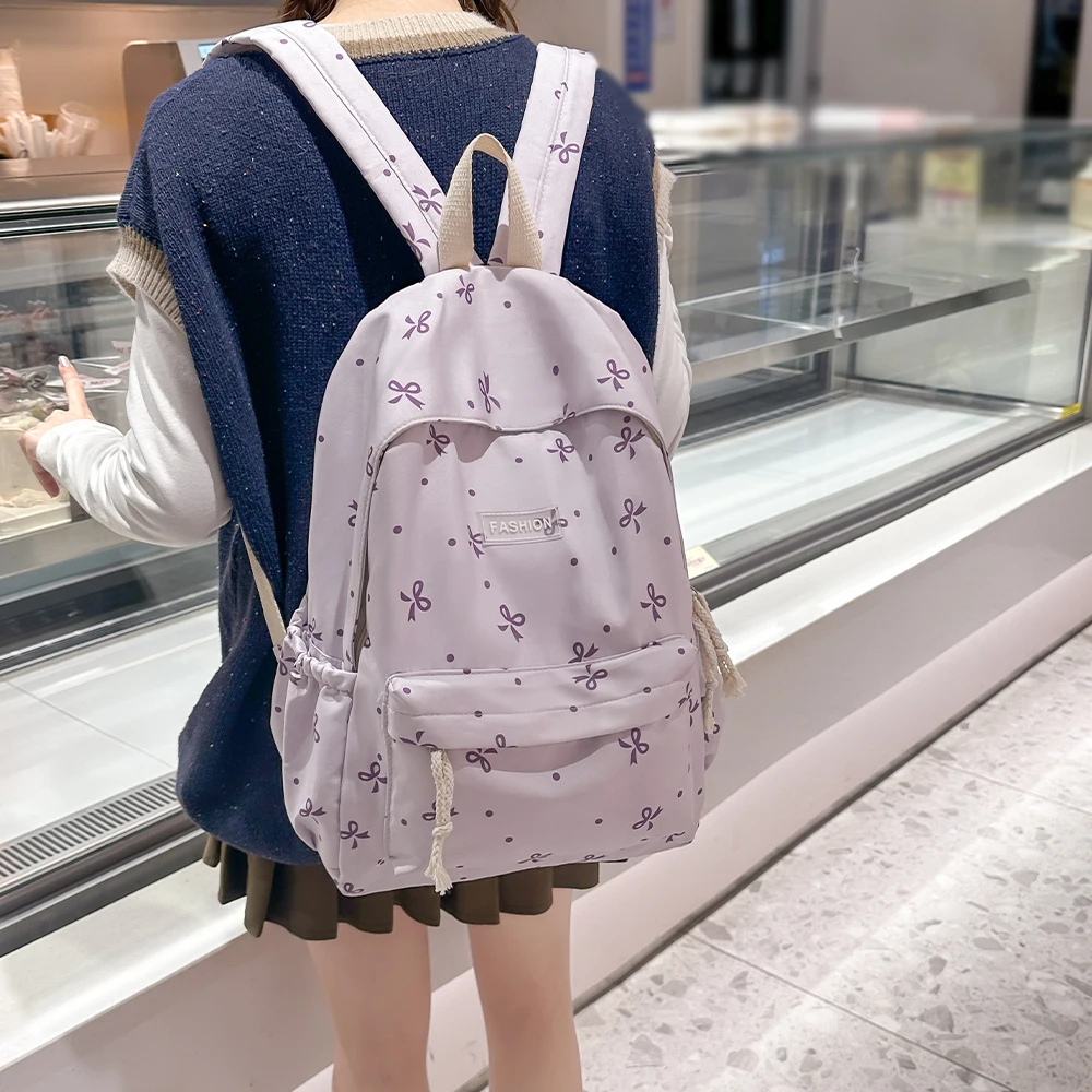 

Women's Backpack New Small Fresh Bow Schoolbag Korean Version of Student Backpack Lightweight Simple Large Capacity Backpack