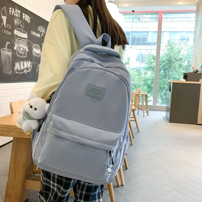 Zaino universitario impermeabile ad alta capacità da uomo moda femminile Borse da scuola per laptop da donna alla moda Borsa da viaggio per ragazza carina Cool