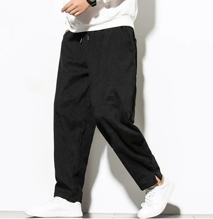 Pantaloni Harem dritti a vita media in velluto a coste tinta unita da uomo pantaloni larghi larghi a gamba larga di grandi dimensioni