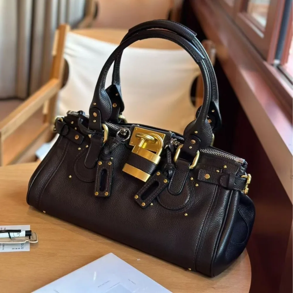 Nicho de cuero de primera calidad, estilo Medieval clásico, nicho Retro, moda versátil, bolso con cerradura antigua, bolso de hombro portátil para axila, tendencia genial