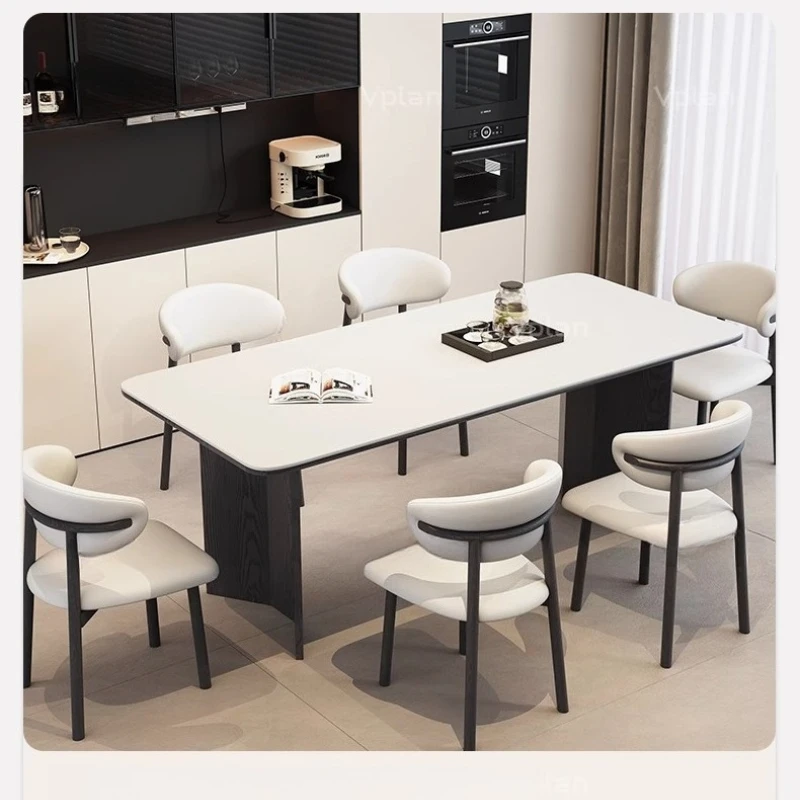 

Light luxury Italian minimalist small apartment rectangular household retro wind rock slab dining table and chair combination
