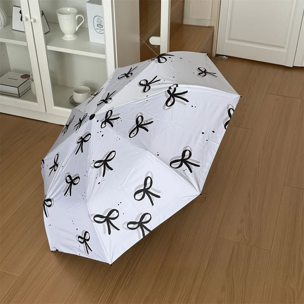 ombrello-carino-e-semplice-con-fiocco-protezione-uv-doppio-uso-sole-pioggia-alto-valore-estetico