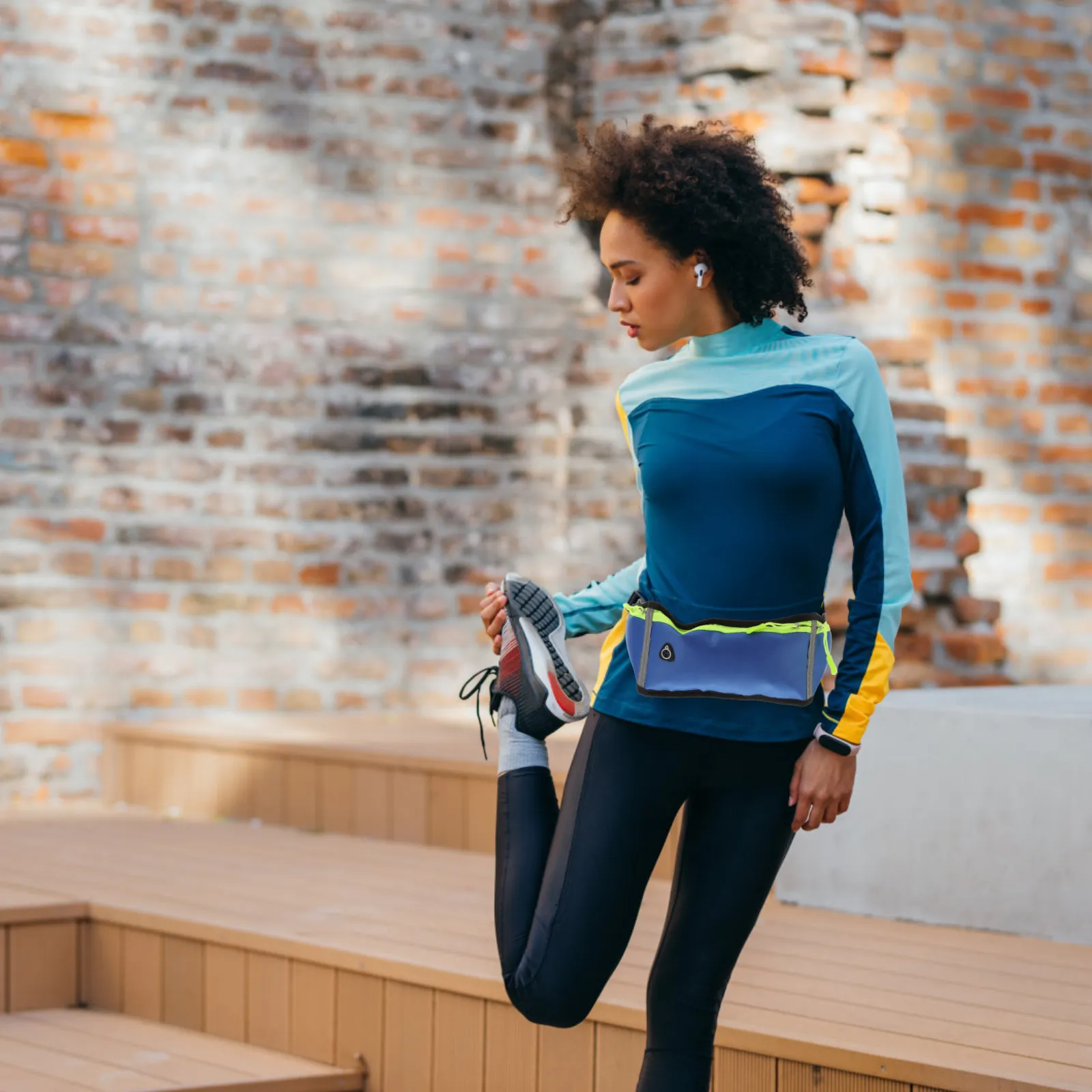 Slim Adjustable Waterproof Nylon Waist Pack for Running Sports Outdoor Activities with Reflective Strips Headphone Hole Phone