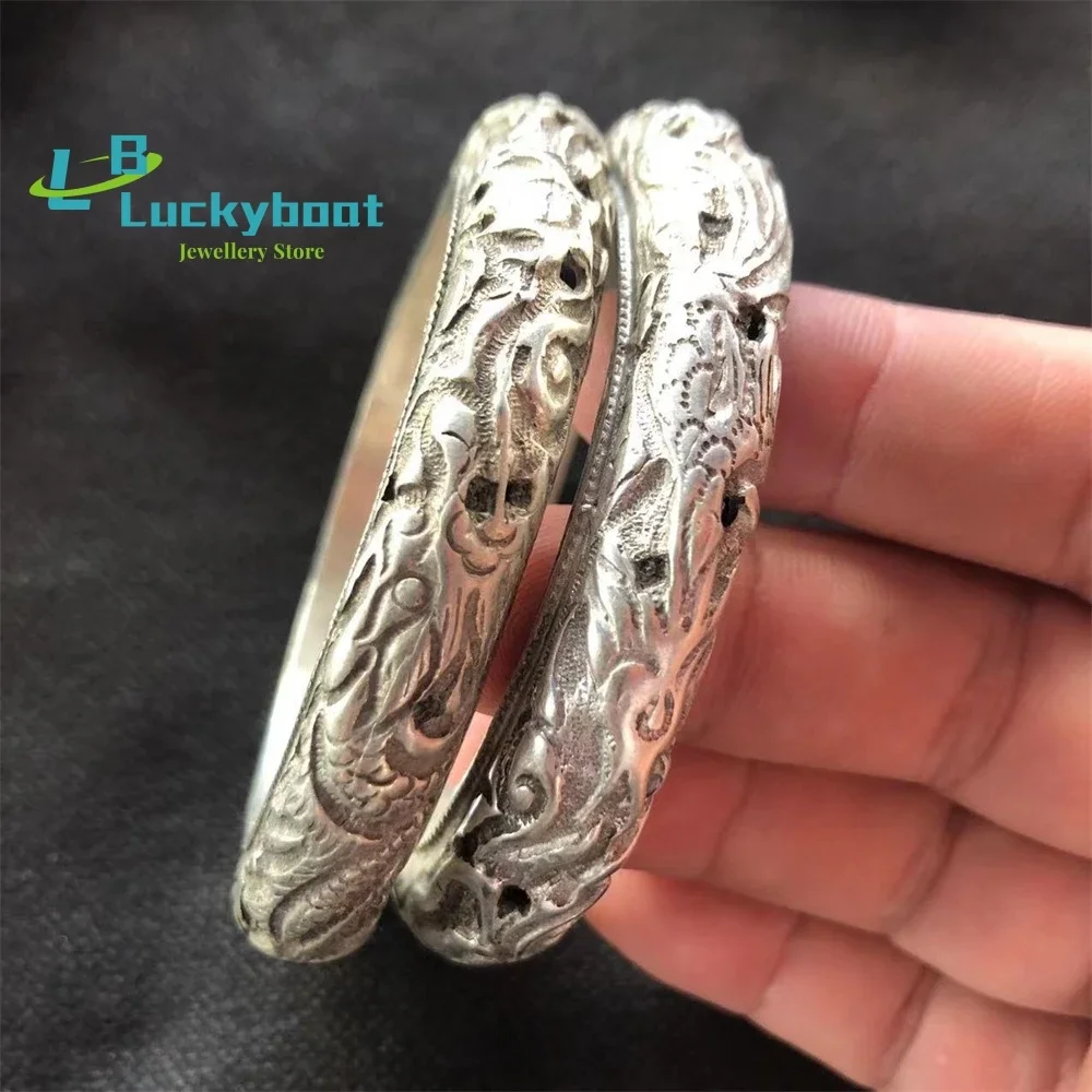 

Винтажный белый медный посеребренный браслет с полым двойным драконом из старого тибетского серебряного браслета Мяо Серебряные украшения