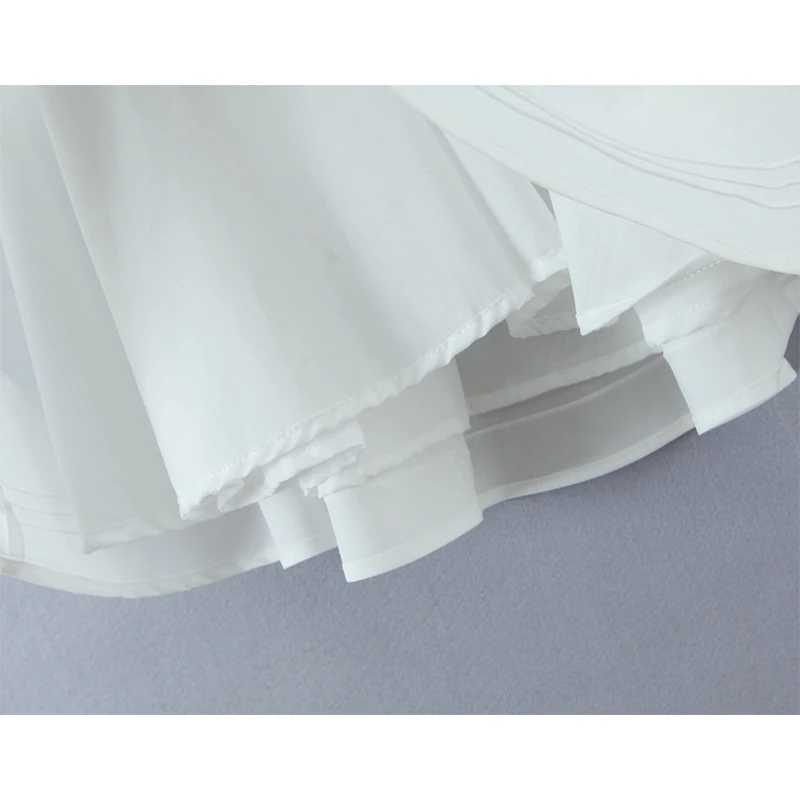 YENKYE Sexy Deep V Halter White Mini Dress Women Fashion Backless A-line Elegant Party Dresses Summer Robe Lace Up Vestidos