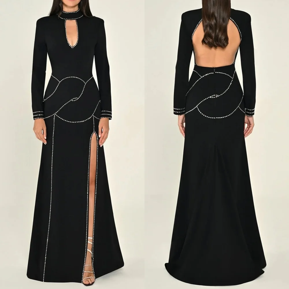 

Доступные размеры по индивидуальному заказу. Изысканный трикотаж со стразами. Длинные платья трапециевидной формы с высоким воротником. Платья для особых случаев на заказ. Высокое качество.