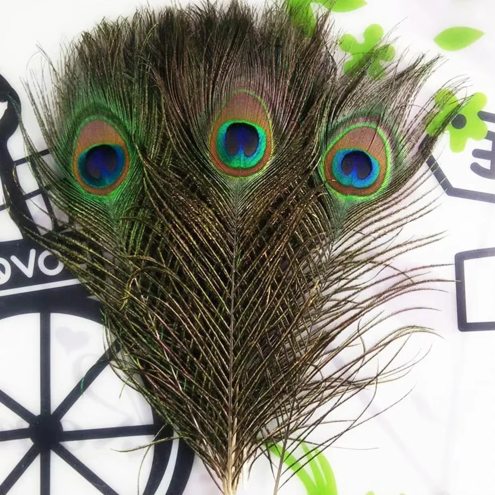 

Wholesale Natural Peacock Feathers DIY Table Centerpieces Peacocks Sword Plume Wedding Party Decoration Carnival Accessories