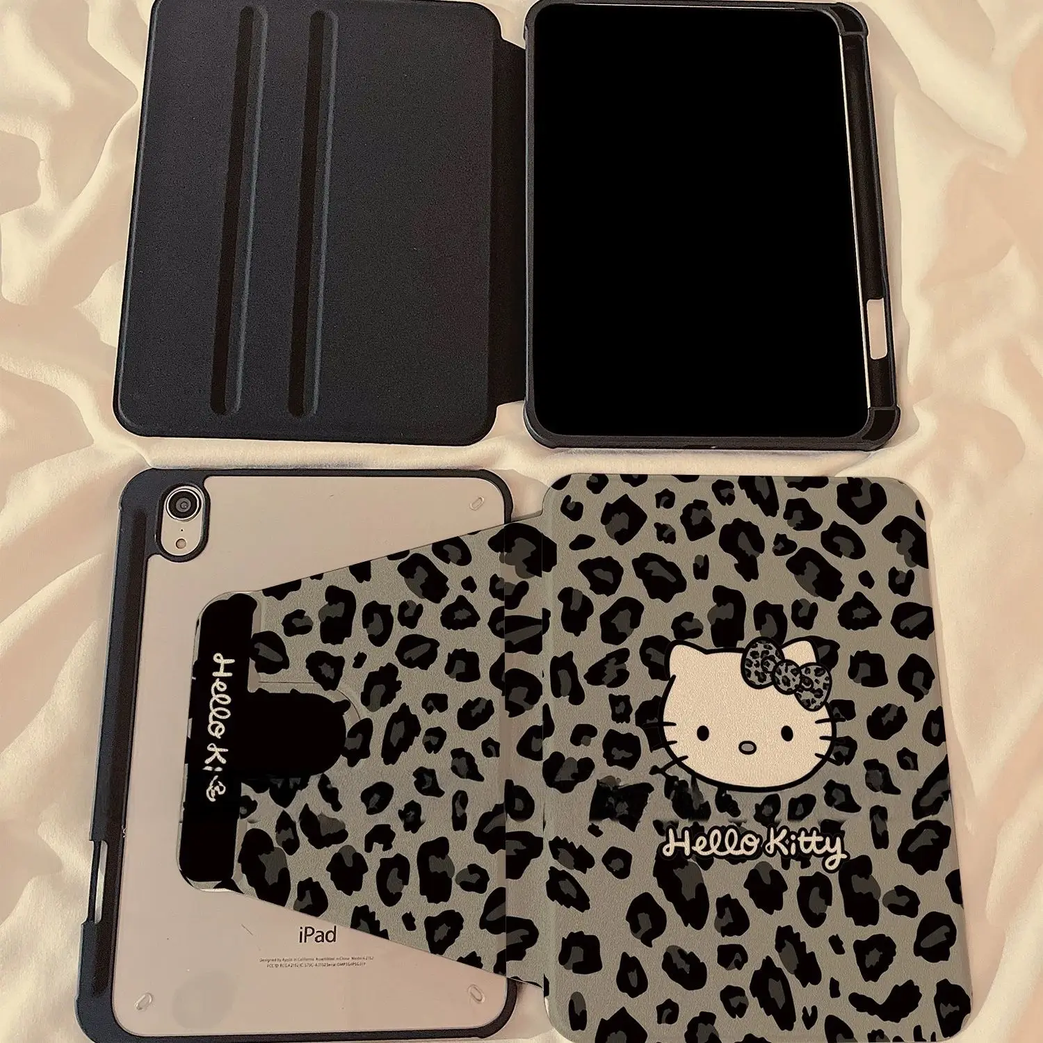 Custodia protettiva per iPad Kawaii Hello Kitty Cartoon Leopard Print Kitty Applicare a Ipad5/6/7/8 Ipadpro18/20/21/22 Mini4/5/6 Girevole