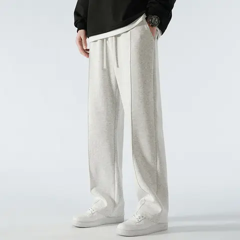 Pantaloni sportivi a gamba larga Pantaloni sportivi 65% cotone Pantaloni larghi Pantaloni fitness autunnali con design di personalità all'aperto allentati neutri