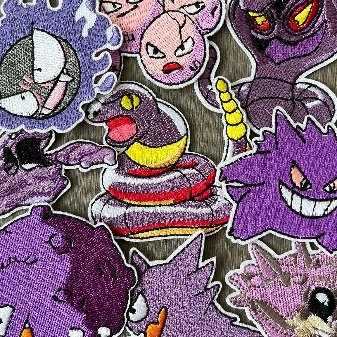 

9Pcs Anime Gengar Snake Game Pokemon Series Iron on Embroidered Patches For Sew on Clothes Jeans Sticker DIY Coat Applique