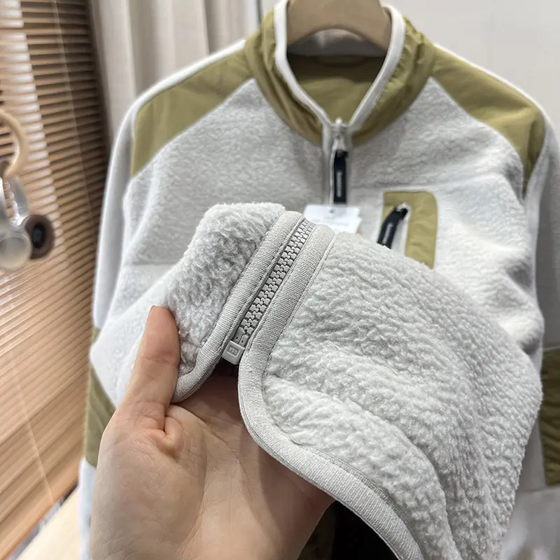 Für den Outdoor-Einsatz im Herbst und Winter ist dieser doppelseitige, warme, dicke, locker geschnittene Mantel mit Stehkragen sowohl für Männer als auch für Frauen geeignet. – Detail 12