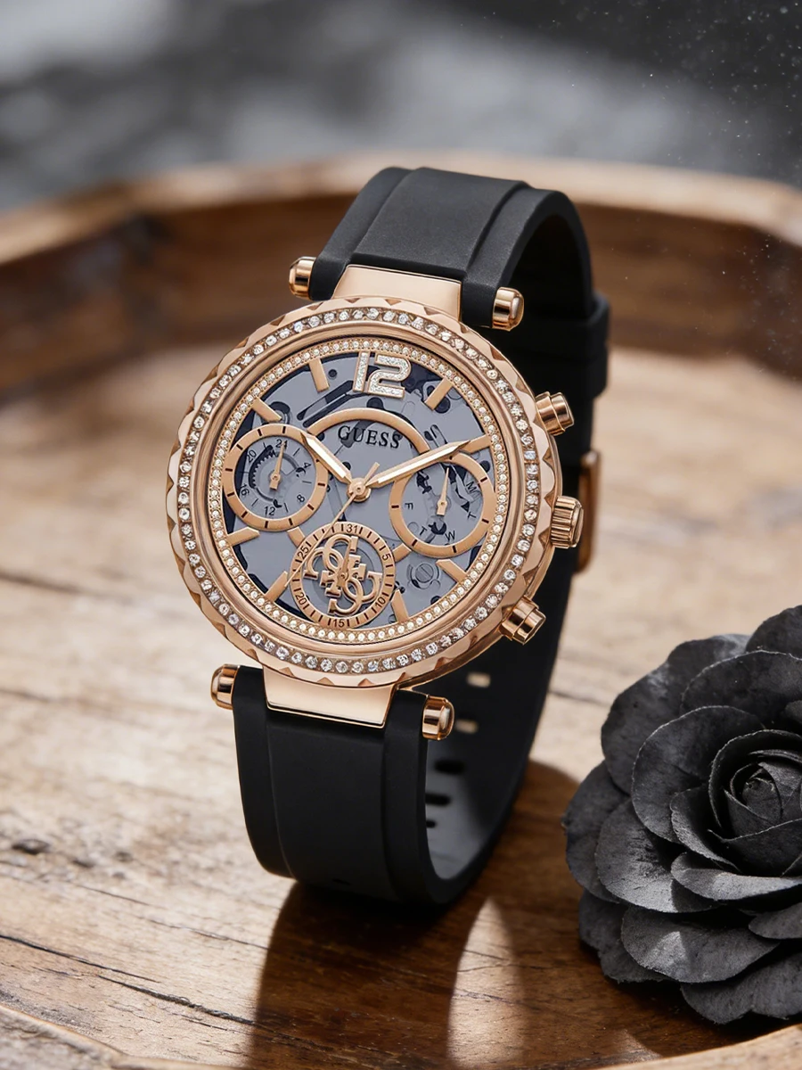 

Guess Women's Watch Black Silicone Strap Rose Gold Tone Chronograph Quartz Crystal Bezel Fashion Accessory for Party Gift