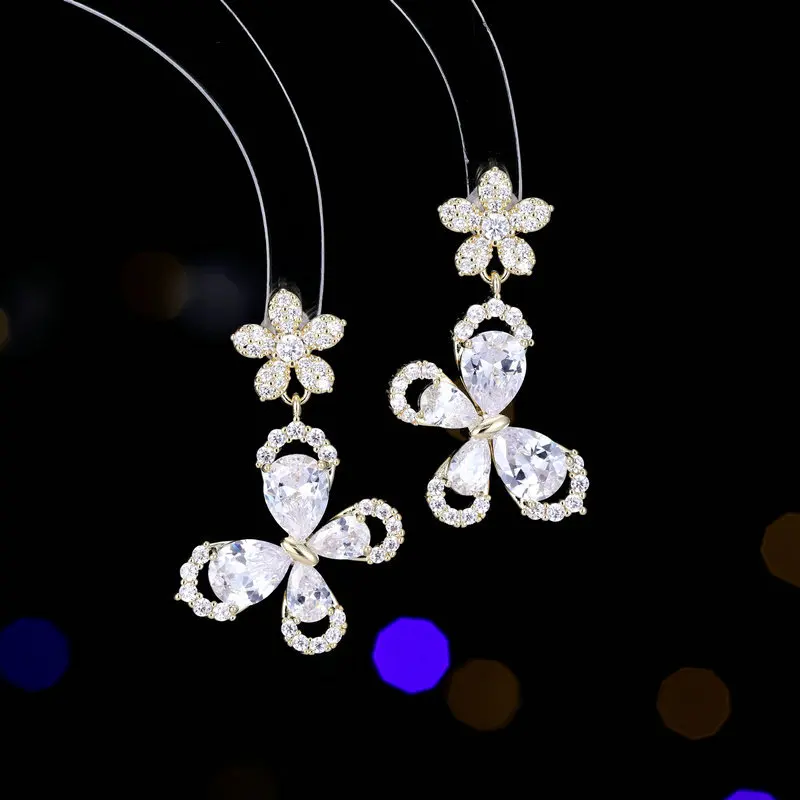 

s925 Silver Needle Earrings for Women, zircon inlaid with simple and versatile flowers, butterfly earrings flying side by side