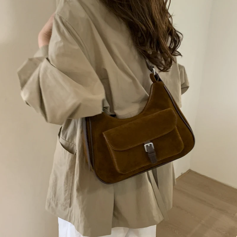 الكورية نمط Ins المتخصصة تصميم ريترو الجلد المدبوغ حمل حقيبة للنساء 2025 جديد الخريف والشتاء ركاب الكتف حقيبة كروسبودي 7573XMT