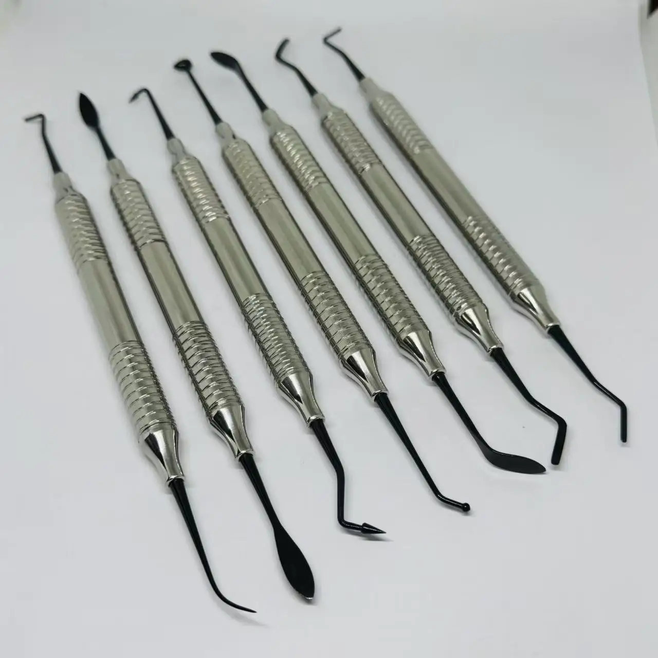 DENILK 7pcs Dental Composite Filling Instrument Featuring Non Stick Black Coated Tips To Prevent Resin From Sticking During Appl