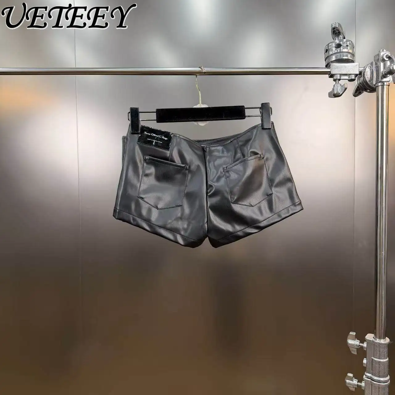 Falda Pantalón Corta de Cuero Sintético con Diseño Irregular y Botones Grandes, Estilo Picante y Fresco de Primavera 2026, Falda Pantalón Corta Negra Sexy para Mujer