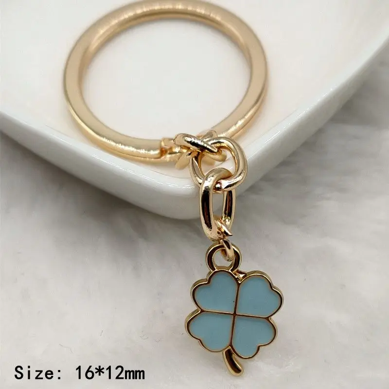 Creative multi-color enamel Four-leaf clover lucky key chain pendant bag accessories girl key chain Christmas gift sales