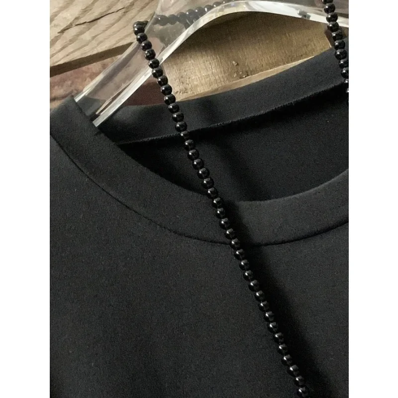 Plus Size Sommer-Damen-T-Shirt, einfarbig, Rundhalsausschnitt, mit Knopfverzierung, unregelmäßigem Saum, kurzärmelig