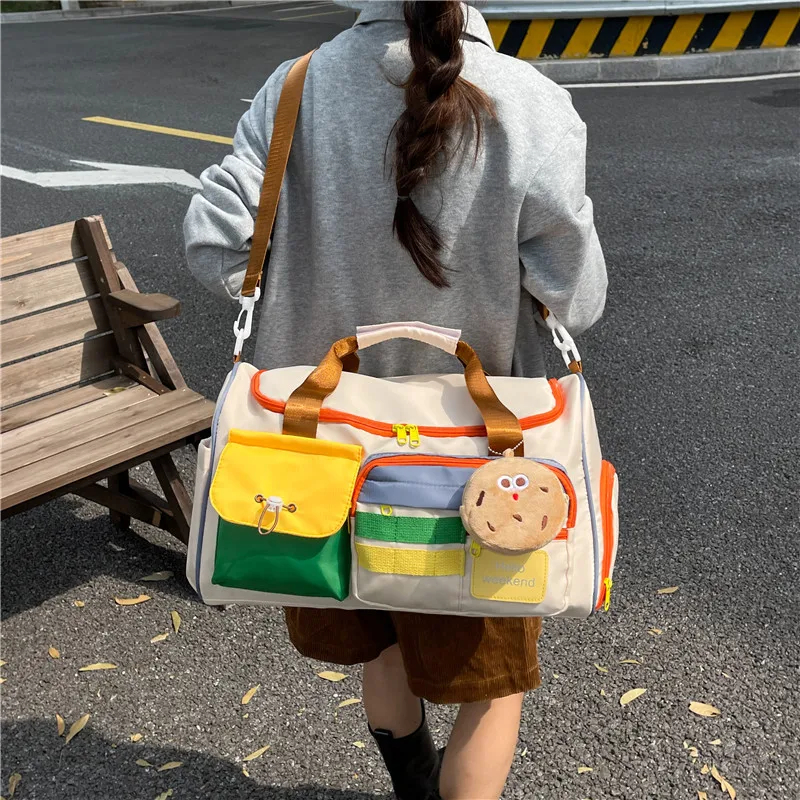 

Nylon fabric waterproof travel bag, large-capacity color-blocking patchwork handbag, cute and portable crossbody backpack