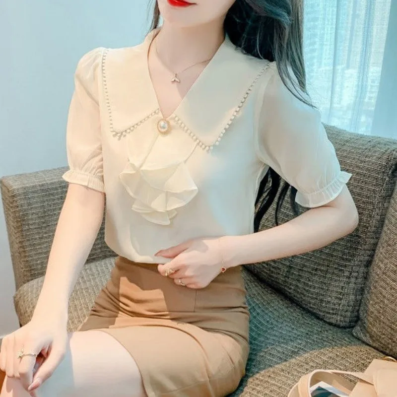 

Fashion Commute 2024 Summer New Chiffon Blouses Women's Spliced Solid Ruffles Beading V-Neck Loose Short Sleeve Pullover Shirts