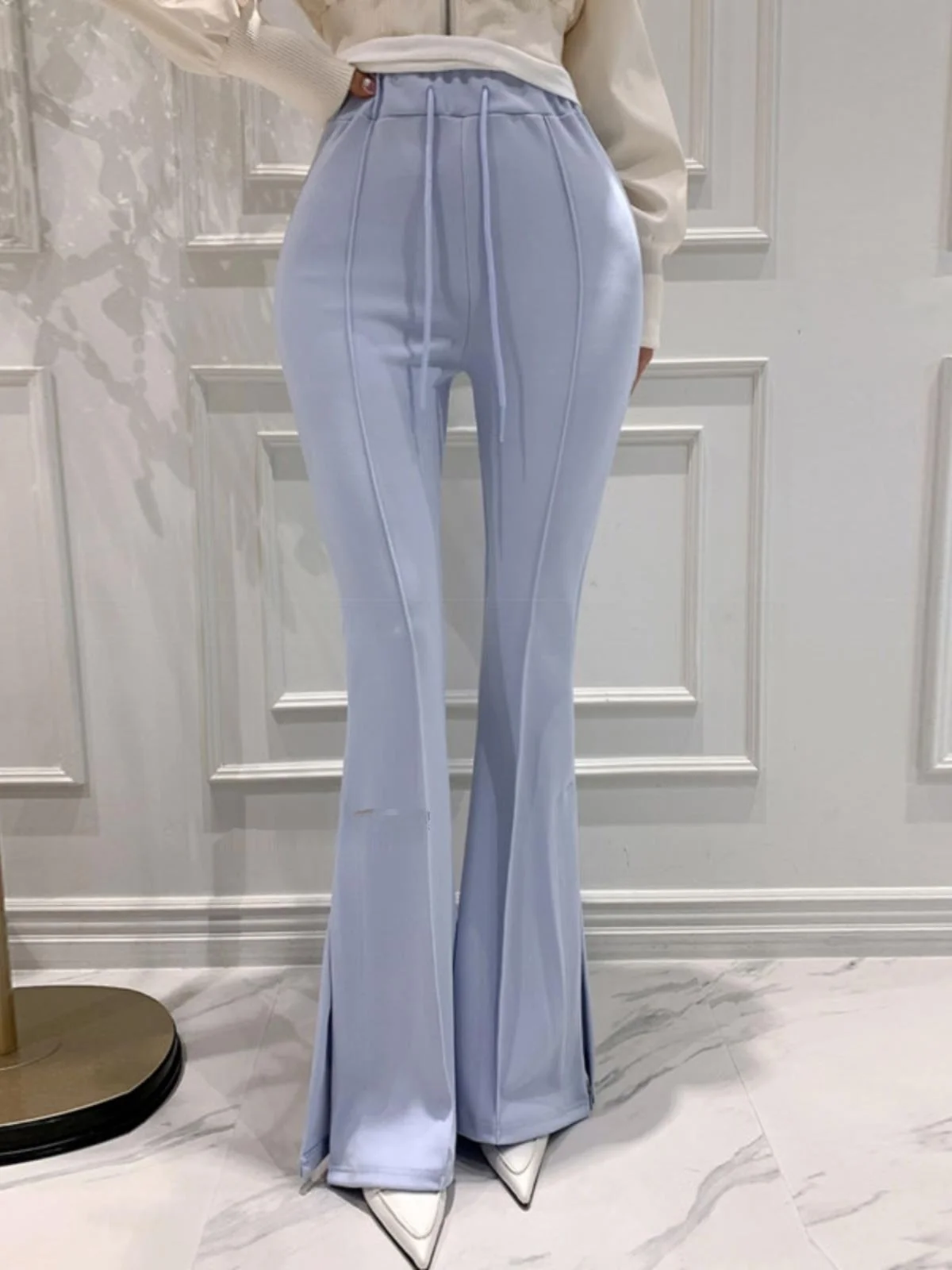 

Ультракомфортные повседневные брюки с эластичной талией, длинными штанинами, разрезами и микро-клешем, супер-стройнящие, модные женские летние брюки