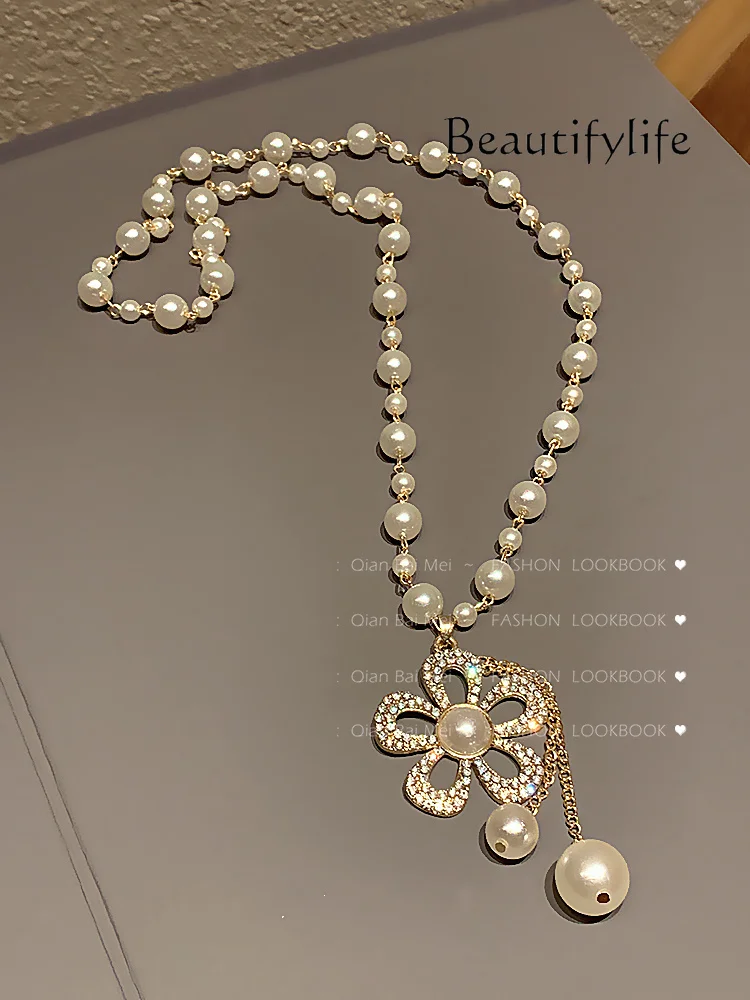 Pearl sweater chain, high-end atmospheric long necklace, new high-end multi-layer pendant chain.