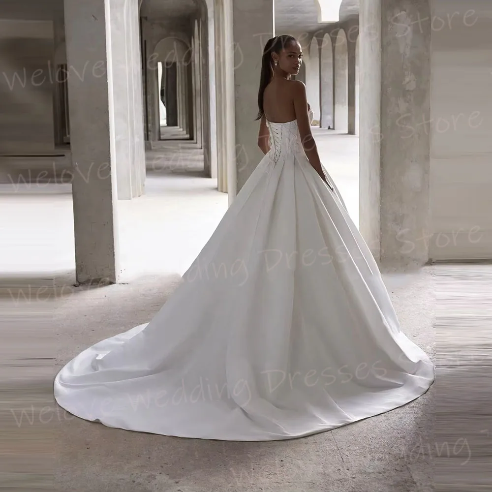 Charmante A-Linie Brautkleider für Damen, trägerlos, Applikationen, Robe De Mariée, individuelle Brautkleider, ärmellos, Vestido De Novia