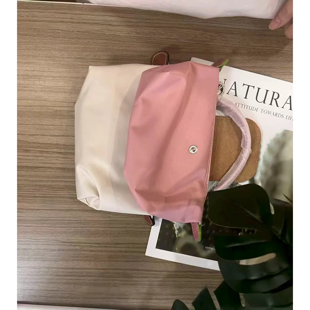 

2025 Mini Dumpling Tote Bag, Compact Handheld Phone Bag, Fashionable and Versatile, Single Shoulder Diagonal Cross Bag