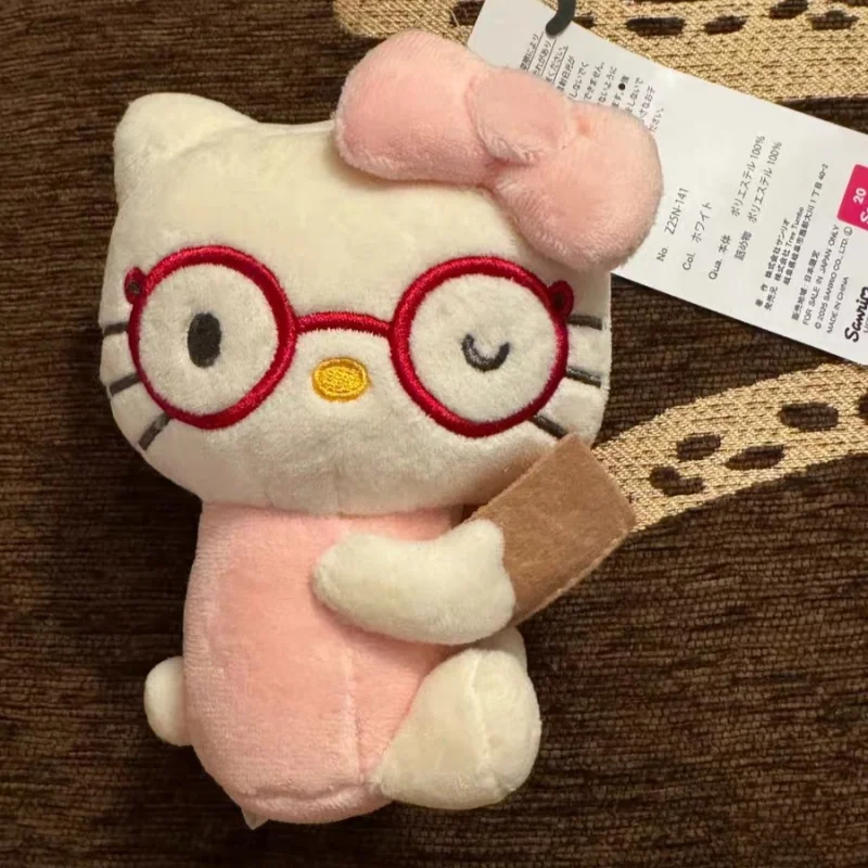 Sanrio Hello Kitty Red Framed Glasses Sitting Posture Read Books Modeling Plush Keychain Backpack Decorations Car Key Pendant
