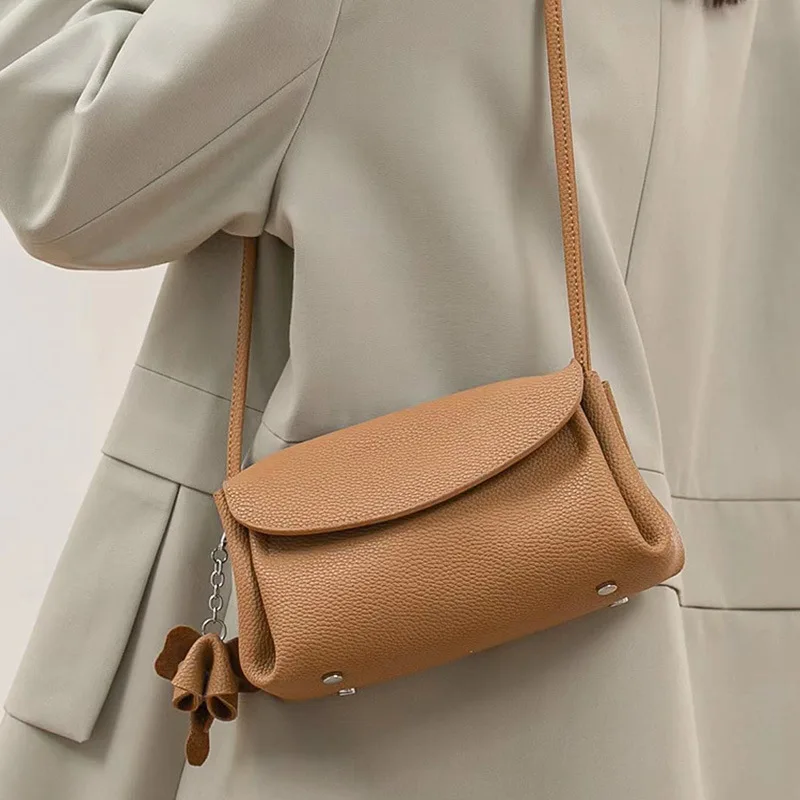 

Multifunctional mobile phone bag, casual storage bag, new leather niche cloud bag, first-layer cowhide shoulder messenger bag