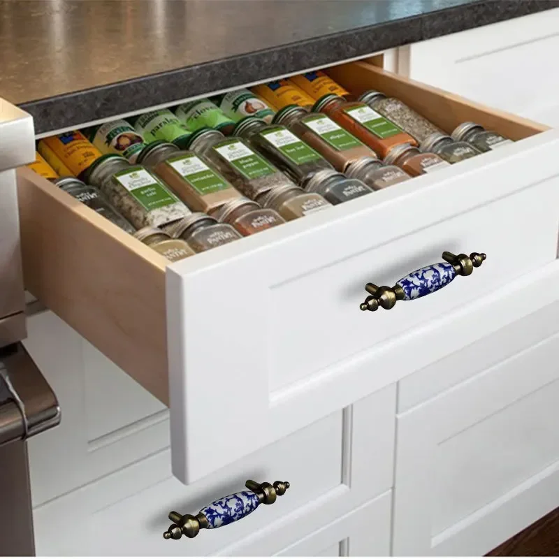 青と白の磁器製キッチンキャビネットハンドル、ソリッドシングルホール引き出しノブ、亜鉛合金ワードローブドアプルハンドル