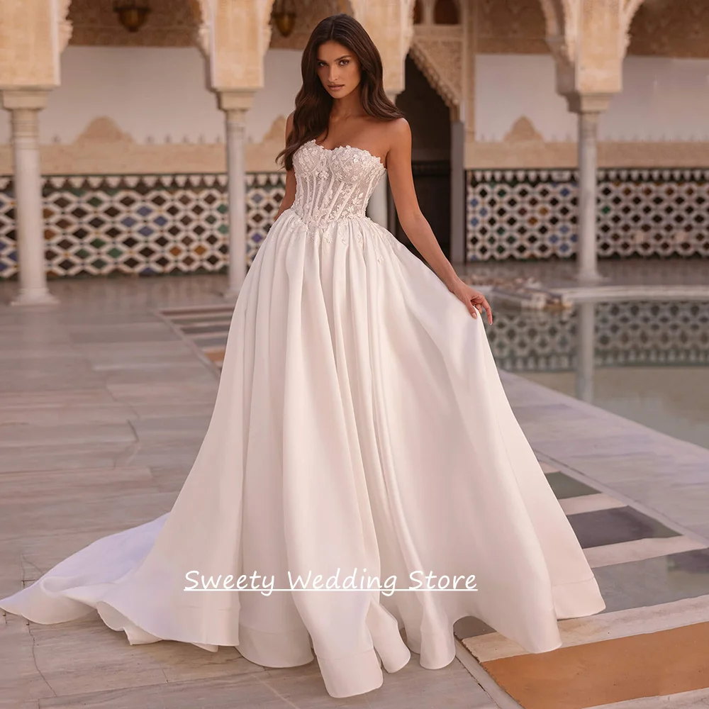 

Customized Wedding Dress Sleeveless Sweetheart Glitter Applique Sweep Train Satin A Line Bridal Gown Vestido De Noiva