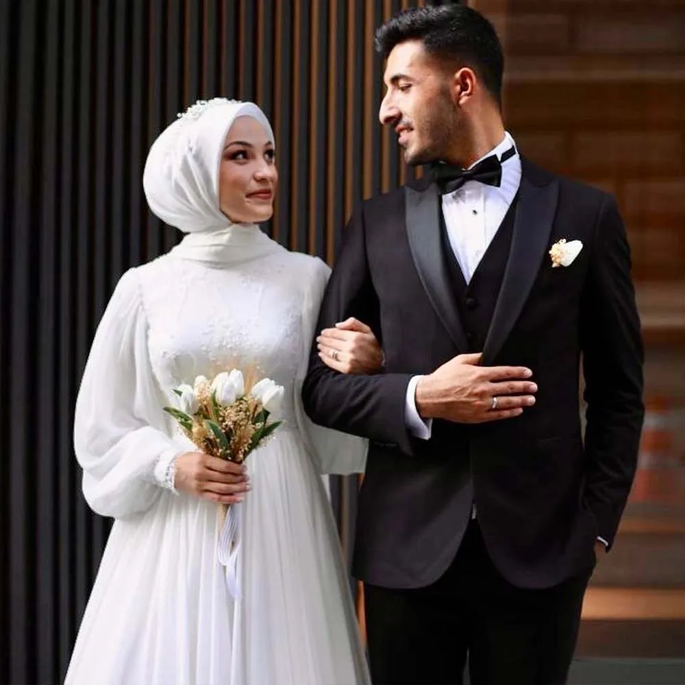 فساتين زفاف إسلامية رائعة مخصصة بياقة عالية عاجية على شكل حرف a 2025 تصميم جديد مزين بالساتان فستان العروس رداء de mariée