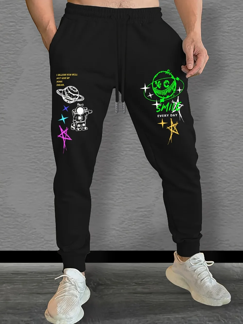 

Daily Fashion Men's Autumn Personalized Graffiti Printed Micro Elastic Comfortable Drawstring Pants Outdoor Street Style Pants