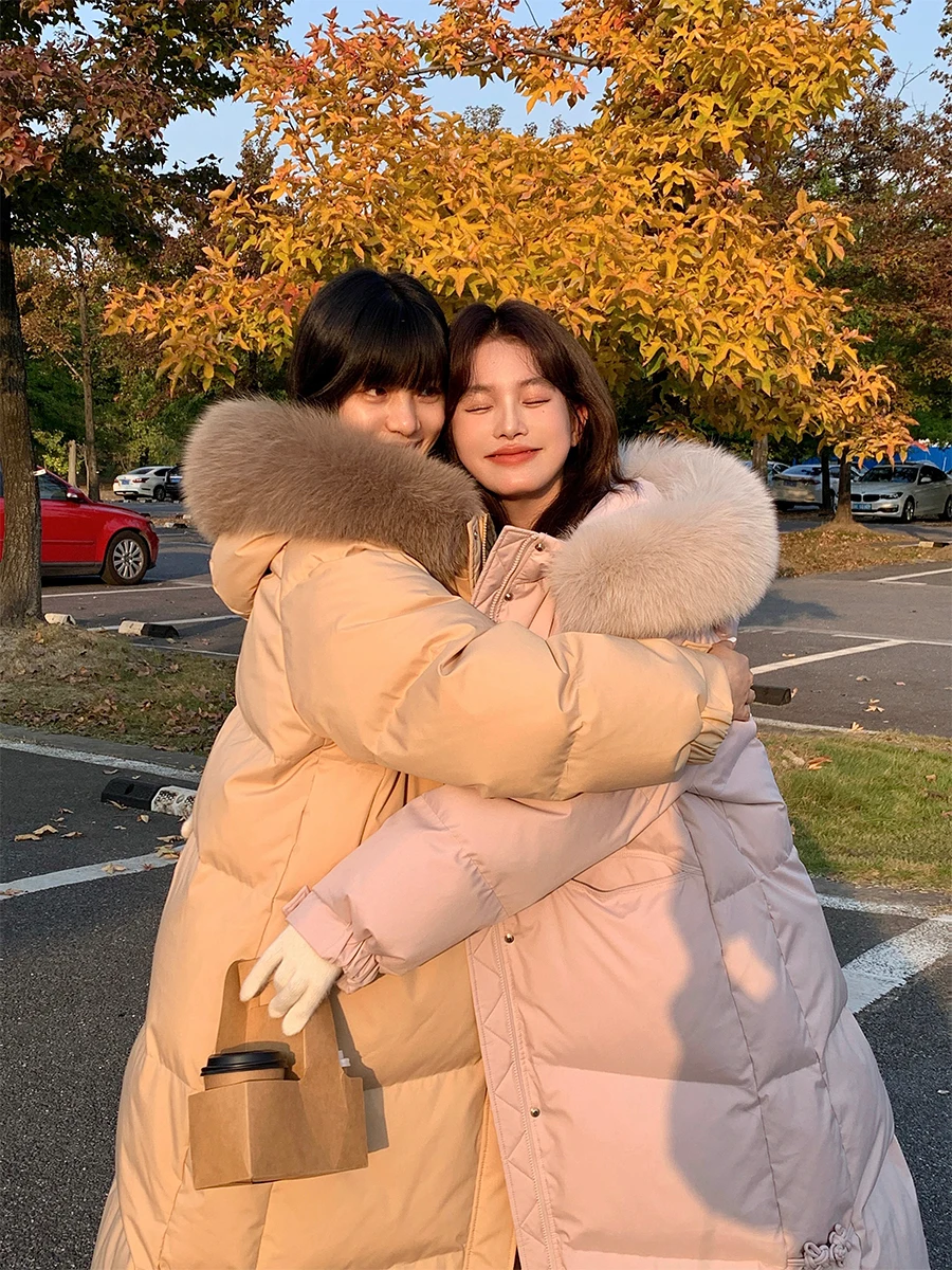 

Модная утепленная женская пуховая куртка оверсайз средней длины из полиэстера с белым пуховым наполнителем