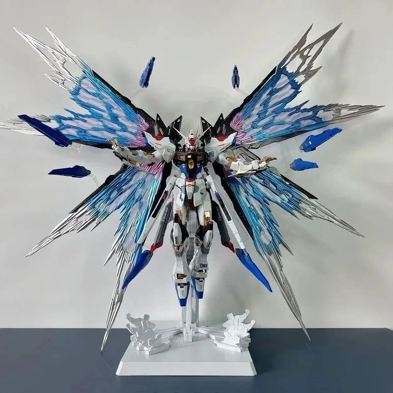 DABAN 8802 Assembly Plastic Model Anime MG 1/100 ZGMF-X20A STRIKE FREEDOM MB Style Platform Water Patch Action Toys Figure Gift