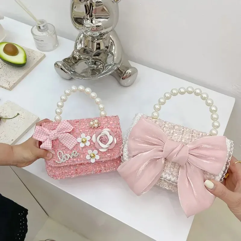 

2025 new Korean version of pearl children's handbag bow princess shoulder messenger bag accessories parent-child bag