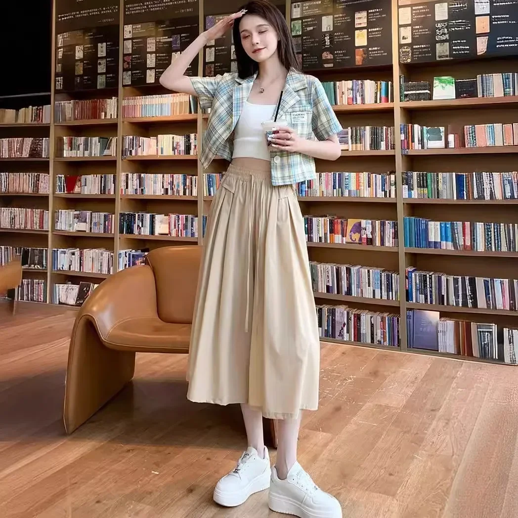 

Новинка 2025 года, универсальные повседневные свободные широкие брюки с высокой талией, юбка из ледяного шелка, восьмиточечные брюки для девочек, однотонный спортивный стиль