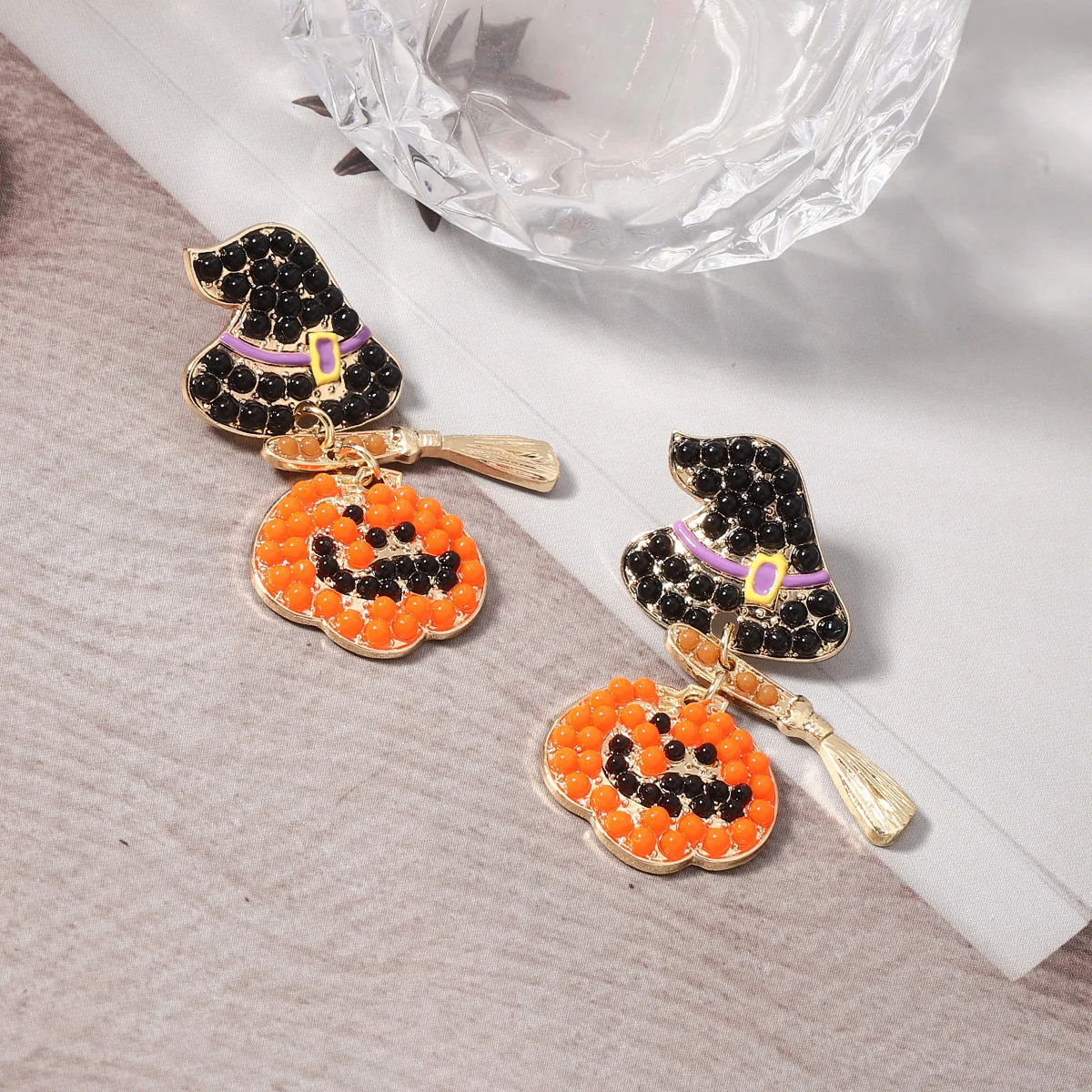 New Halloween creative niche design sense Harry hat riding a broom pumpkin fashion versatile earrings