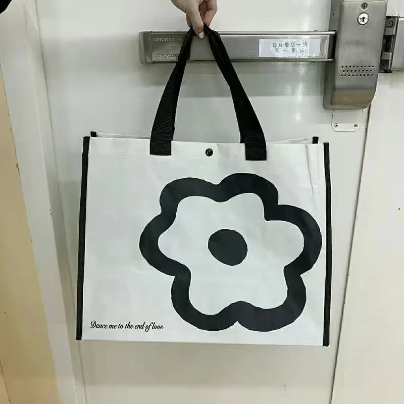 2023 borse per la spesa con fiori giapponesi Design di nicchia interessanti studentesse borsa portatile di protezione ambientale di grande capacità