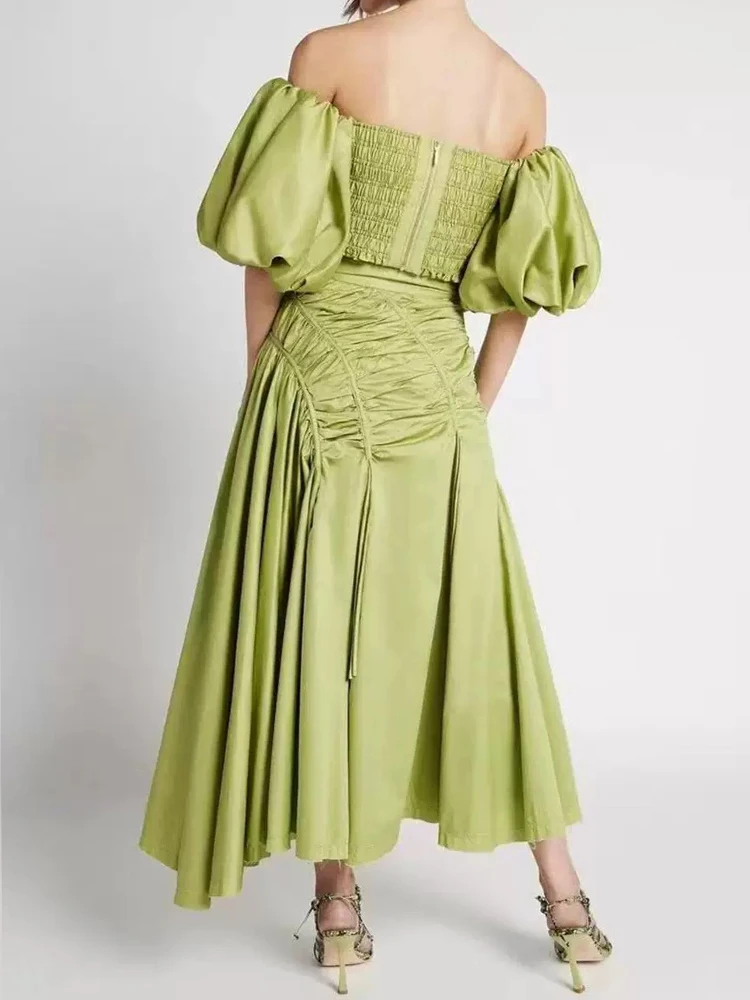 In the summer of 2025, the new two-piece one-word collar bubble sleeve elastic short top+high waist skirt fashion women's suit.