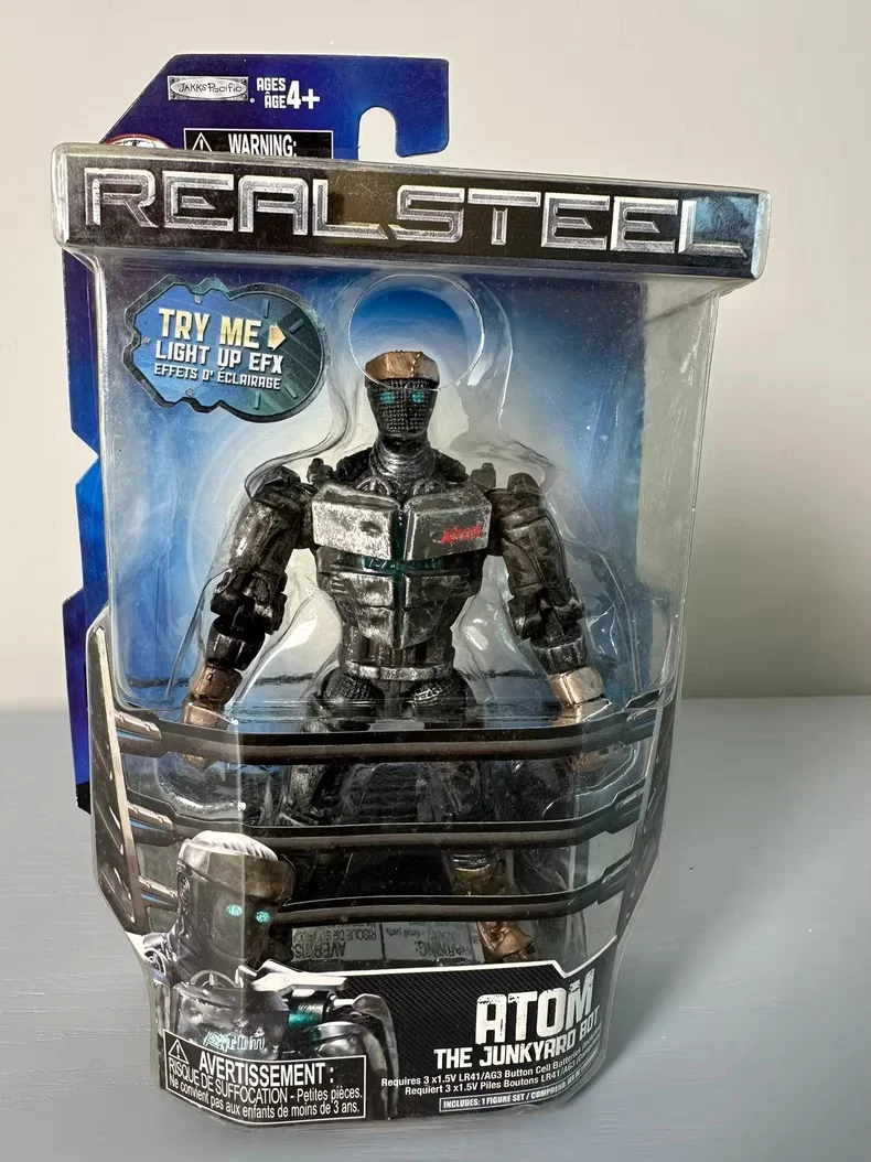 Figura de robot Atom de acero real Serie 1 Mecha de chatarra con efectos de luz azul, articulaciones articuladas, embalaje original sin abrir