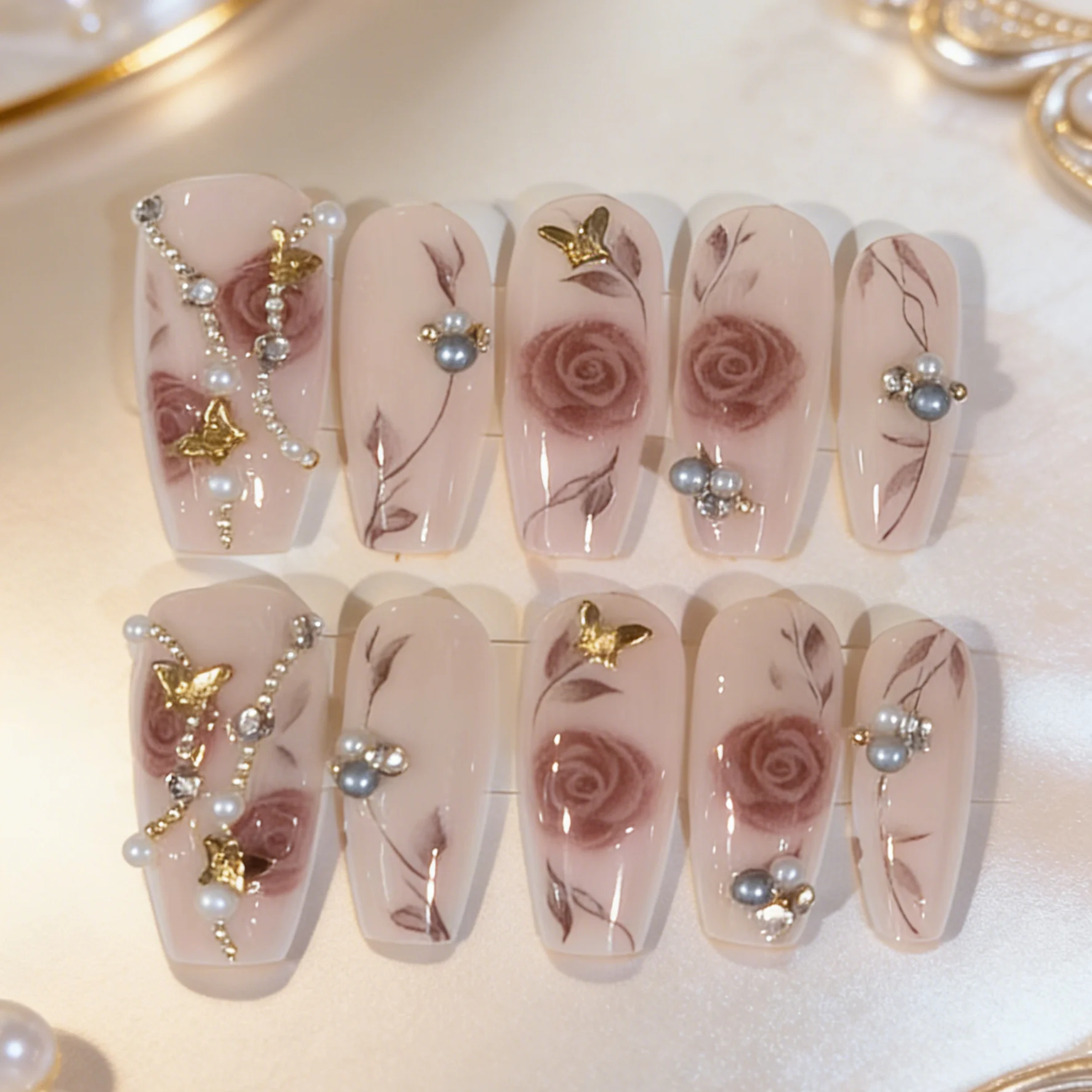 10 hand-pressed coffin-shaped false nails, featuring Chinese-style butterflies-around-flowers, for women.