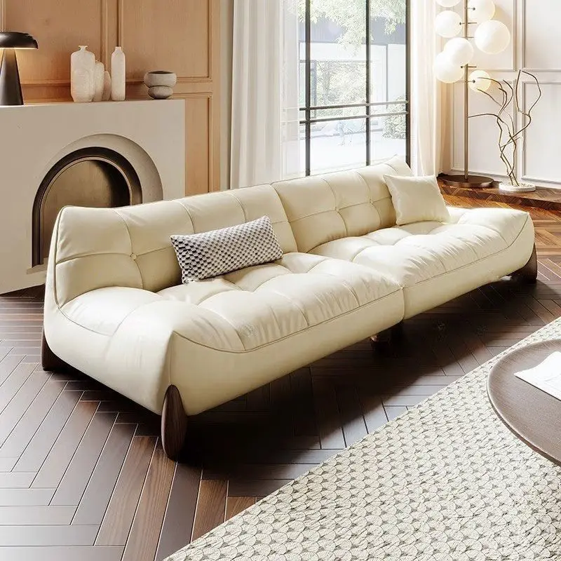 Foshan modern simple leather sofa living room size apartment concubine light luxury lazy cream wind cloud sofa